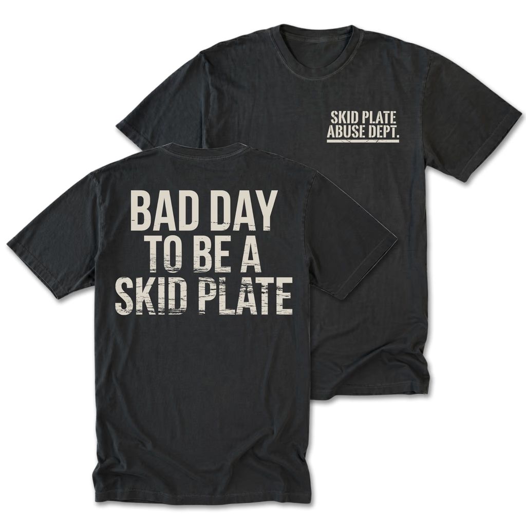 Black Tall Tee featuring the Bad Day to Be a Skid Plate design on the back by Trail Snark.