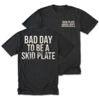 Black Tall Tee featuring the Bad Day to Be a Skid Plate design on the back by Trail Snark.