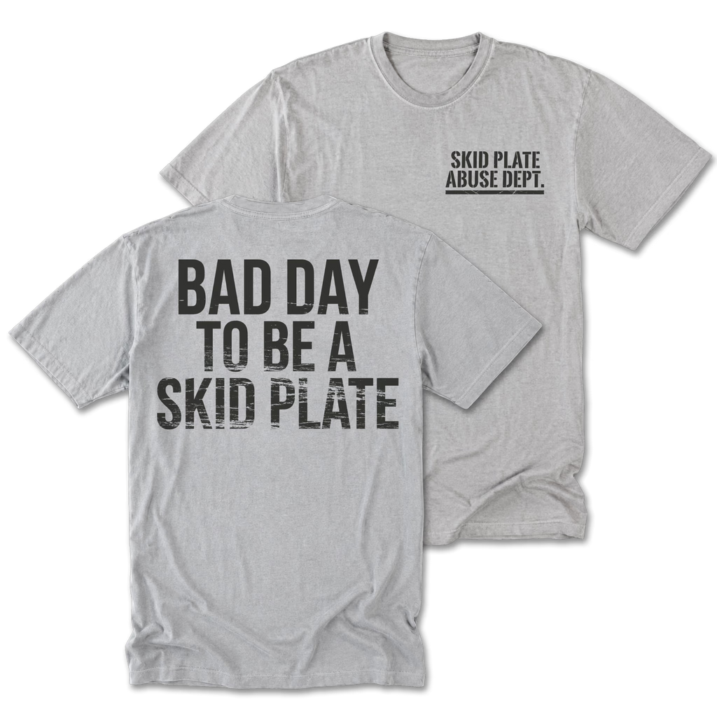 Light Steel Tall Tee featuring the Bad Day to Be a Skid Plate design on the back by Trail Snark.