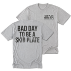 Light Steel Tall Tee featuring the Bad Day to Be a Skid Plate design on the back by Trail Snark.