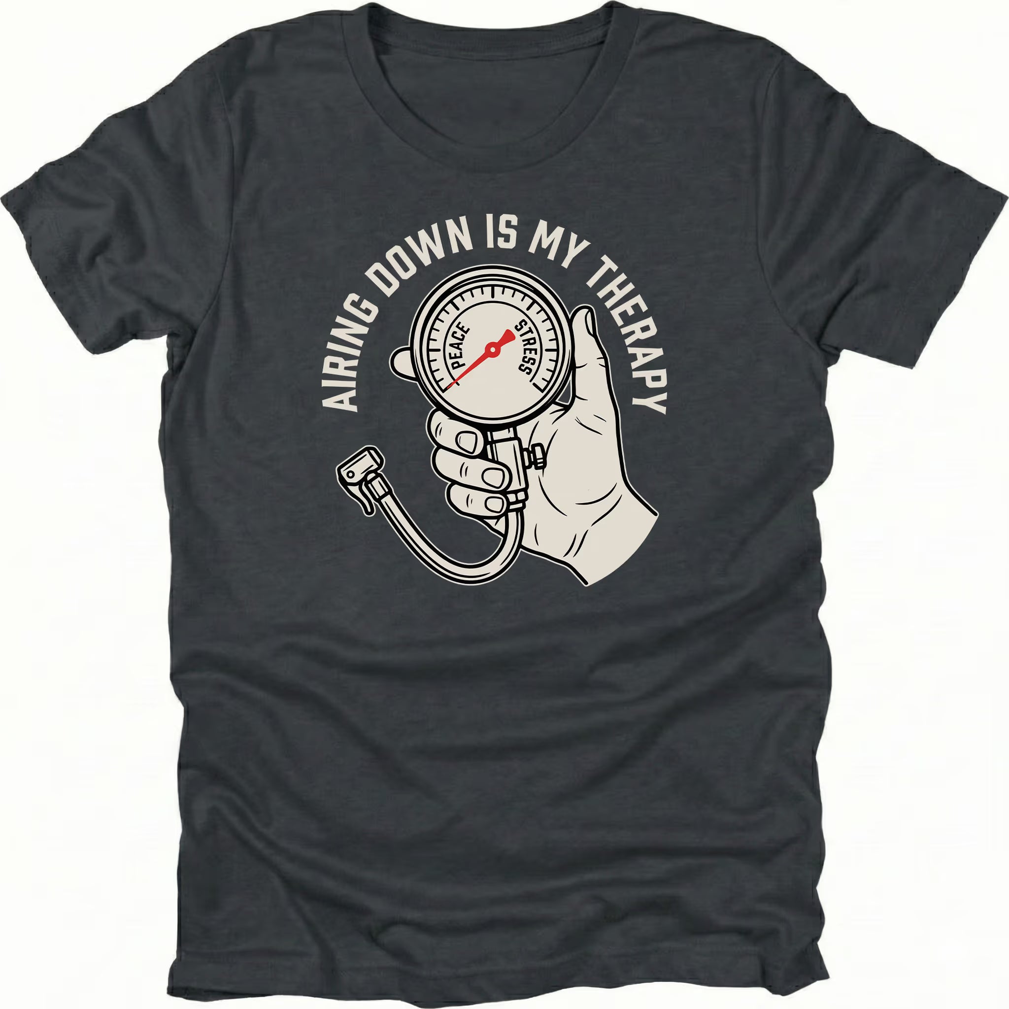 Black t-shirt featuring an airing down is my therapy tire pressure gauge graphic shown from the front by Trail Snark.