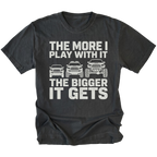 Black T-Shirt featuring The More I Play With It The Bigger It Gets design with three progressively lifted trucks shown on the front view by Trail Snark.
