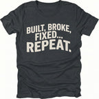 Black t-shirt featuring built broke fixed repeat bold text graphic shown from the front by Trail Snark.