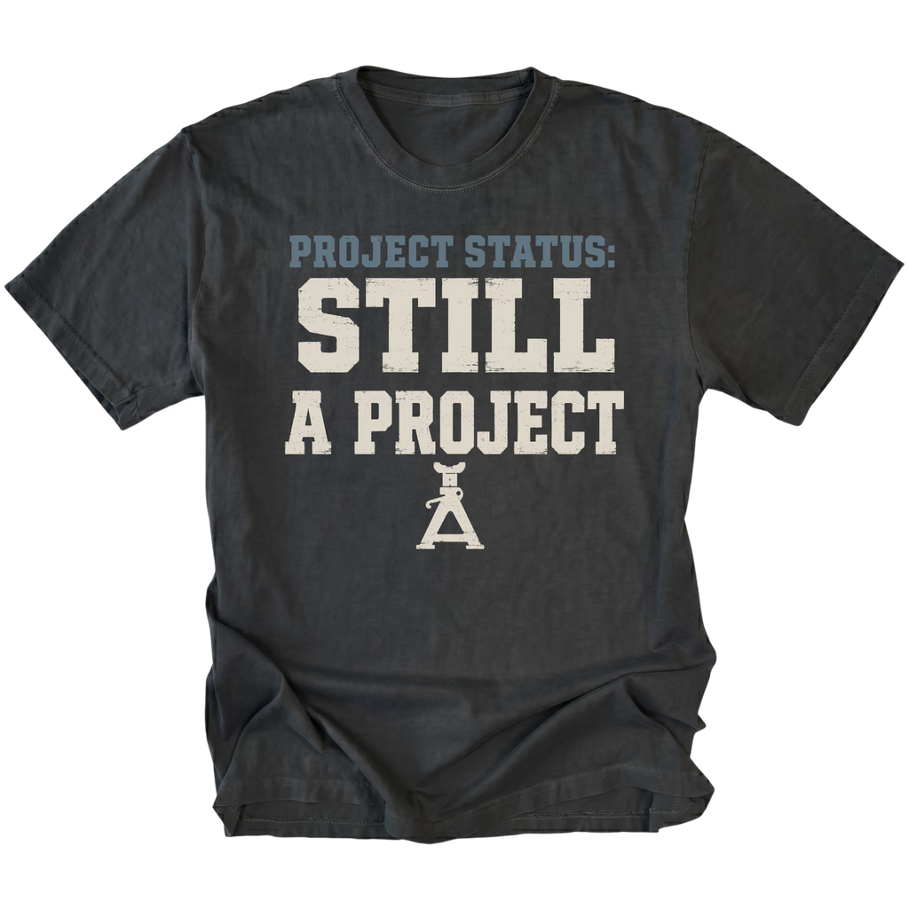 Black T-Shirt featuring the Still A Project design on the front by Trail Snark.