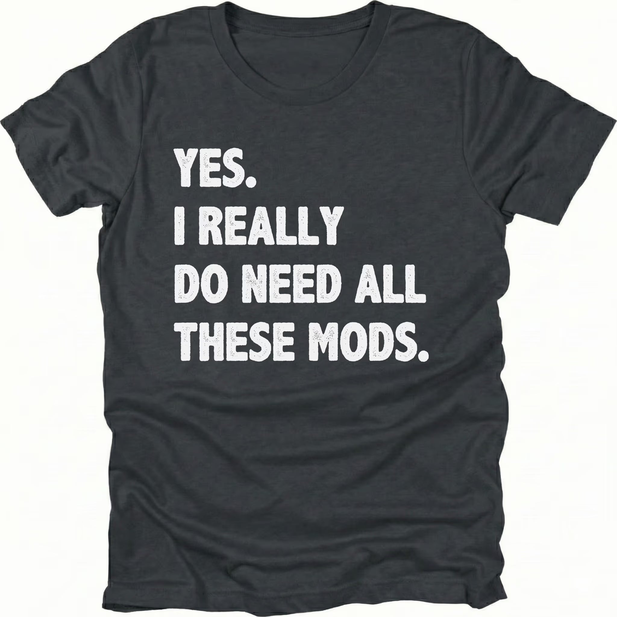 Black t-shirt with bold white text reading “Yes I Really Do Need All These Mods” displayed on the front by Trail Snark.