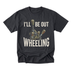 A black short-sleeve t-shirt with a graphic print of a tank gun barrel and the text 'I'LL BE OUT WHEELING' in a distressed off-white font, shown on a solid white background.