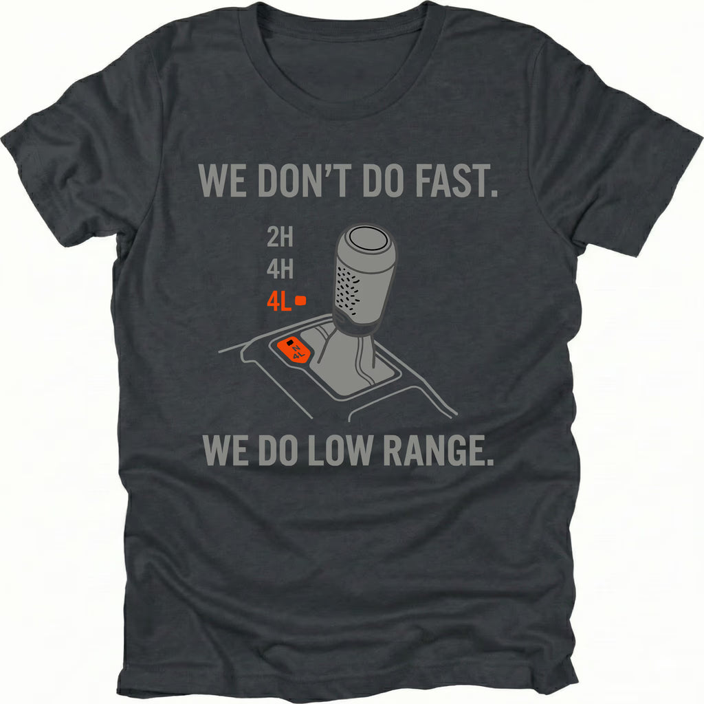 Black t-shirt featuring a 4x4 transfer case shifter graphic with text reading “We Don’t Do Fast. We Do Low Range.”