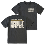 Black T-Shirt with Ongoing Project front design and Built Not Bought Rebuilt Repeatedly back design shown by Trail Snark.