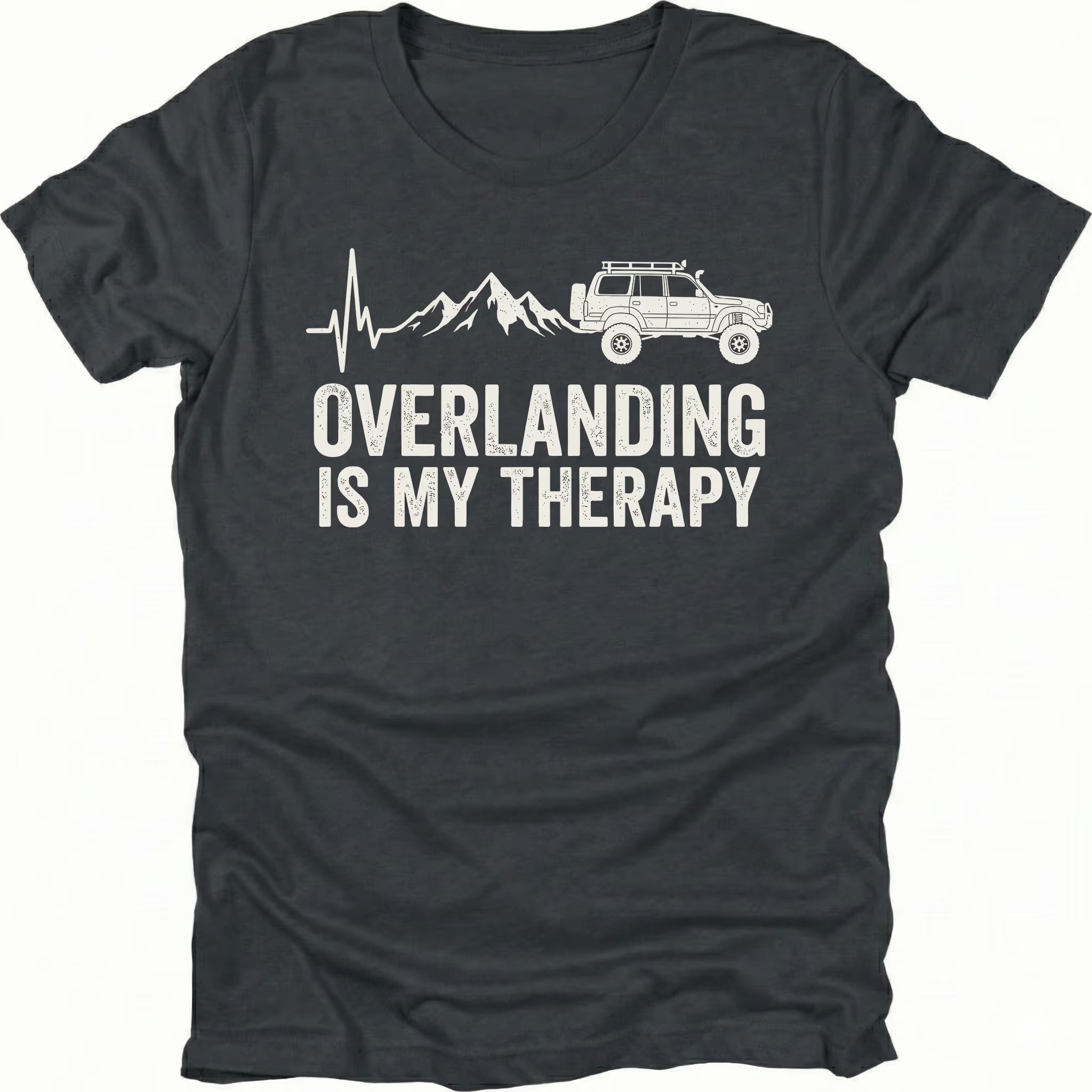 Black T-Shirt with heartbeat line, mountains, and vehicle graphic reading “Overlanding Is My Therapy” shown on front view by Trail Snark.