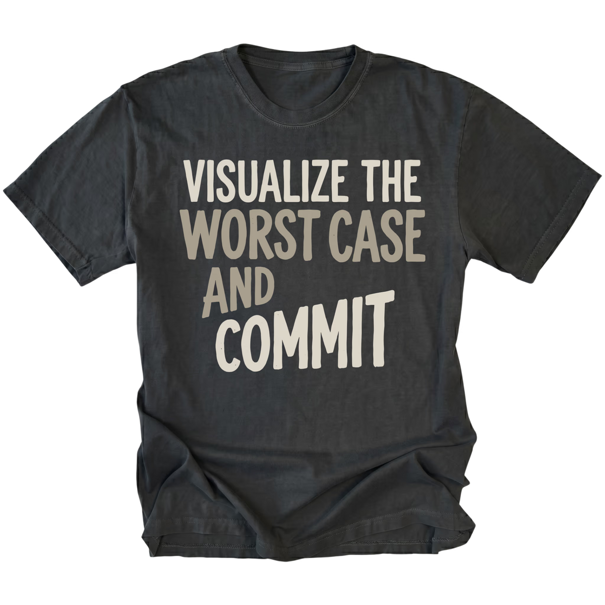 A black t-shirt with the phrase 'VISUALIZE THE WORST CASE AND COMMIT' printed on the front in a light beige sans-serif font, displayed against a solid white background.