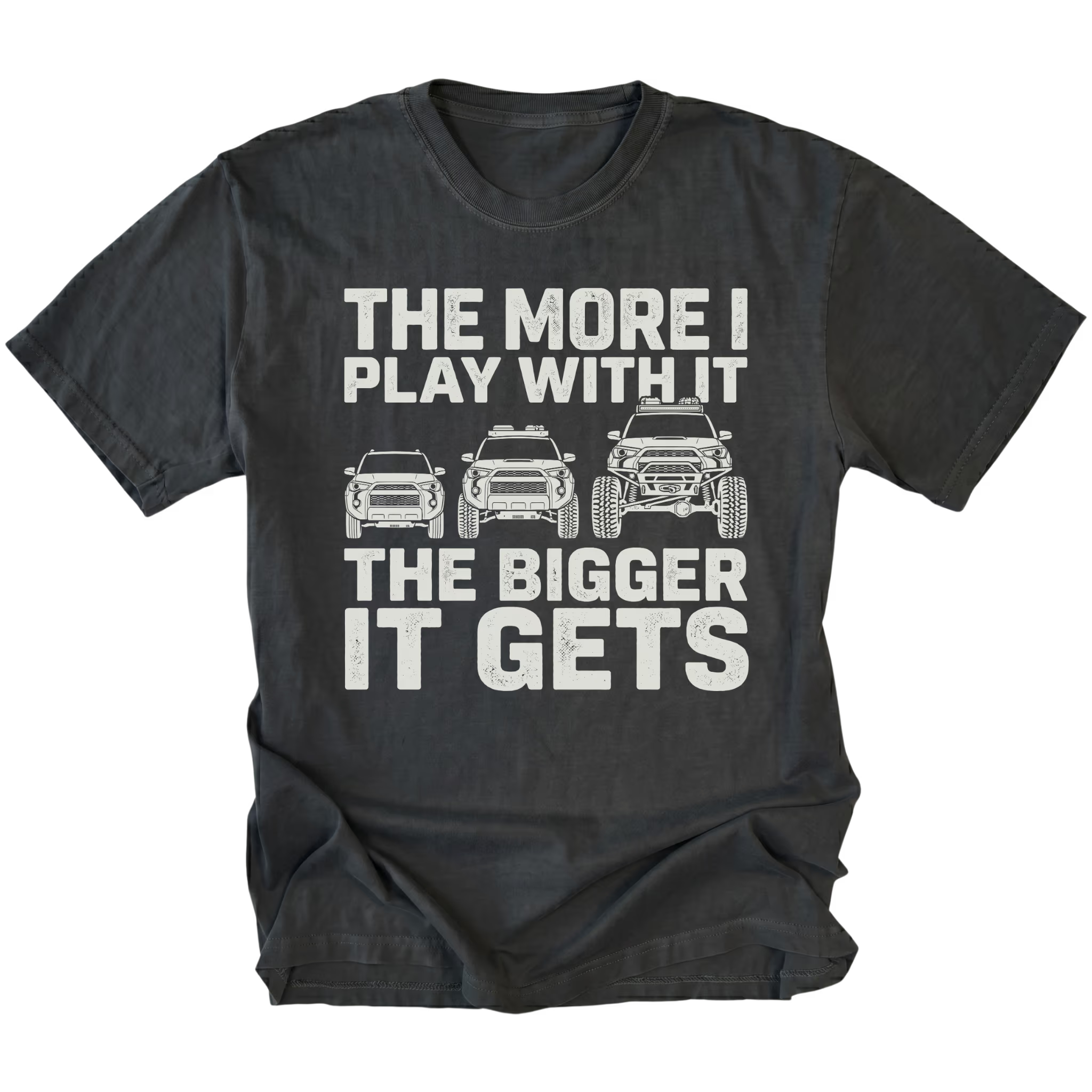 Black T-Shirt featuring The More I Play With It The Bigger It Gets design with three progressively modified Toyota 4Runner style SUVs on the front view by Trail Snark.