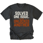 Black T-Shirt with the Solved One Issue. Unlocked Another design shown in a front view by Trail Snark.