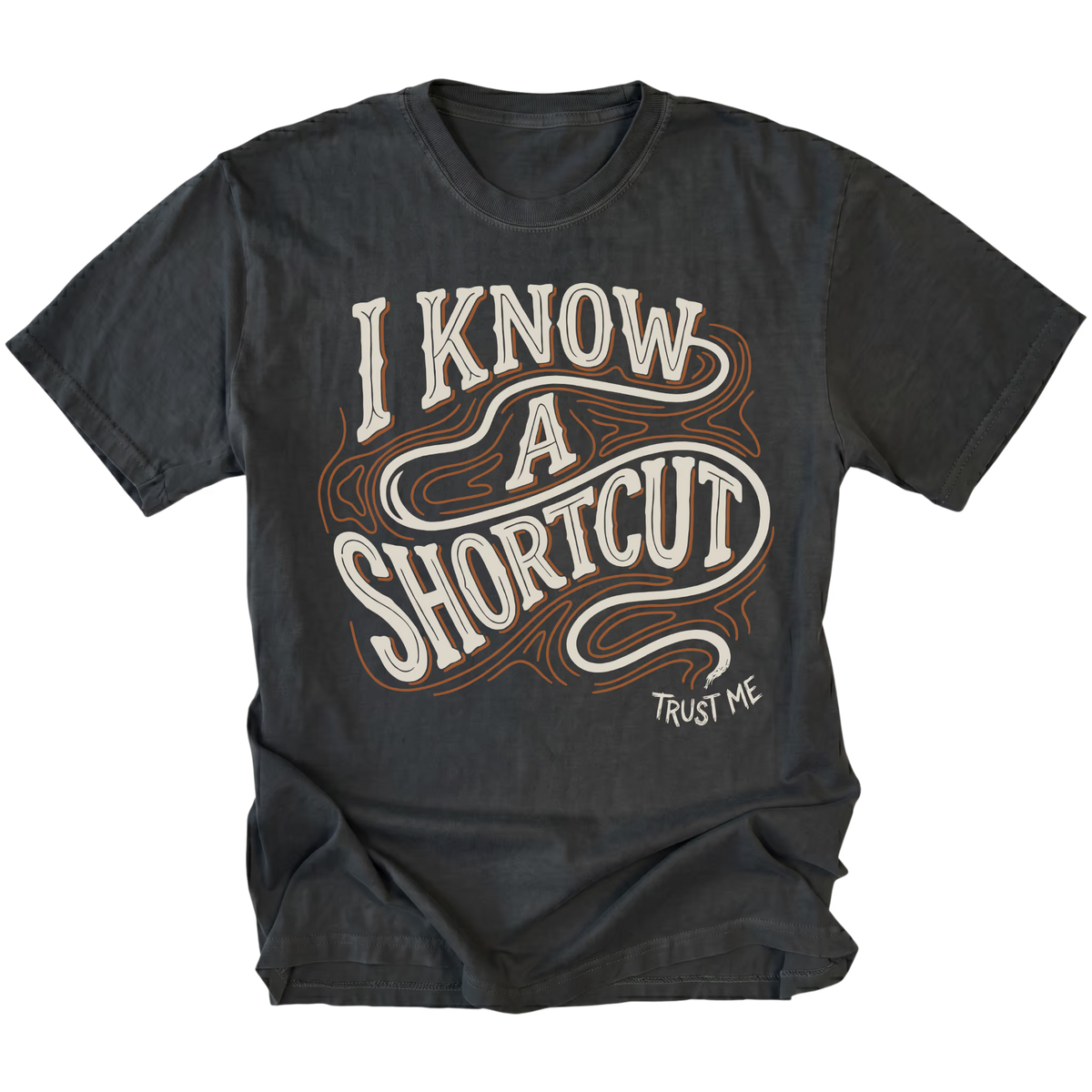 Black T-shirt featuring the I Know a Shortcut design on the front by Trail Snark.