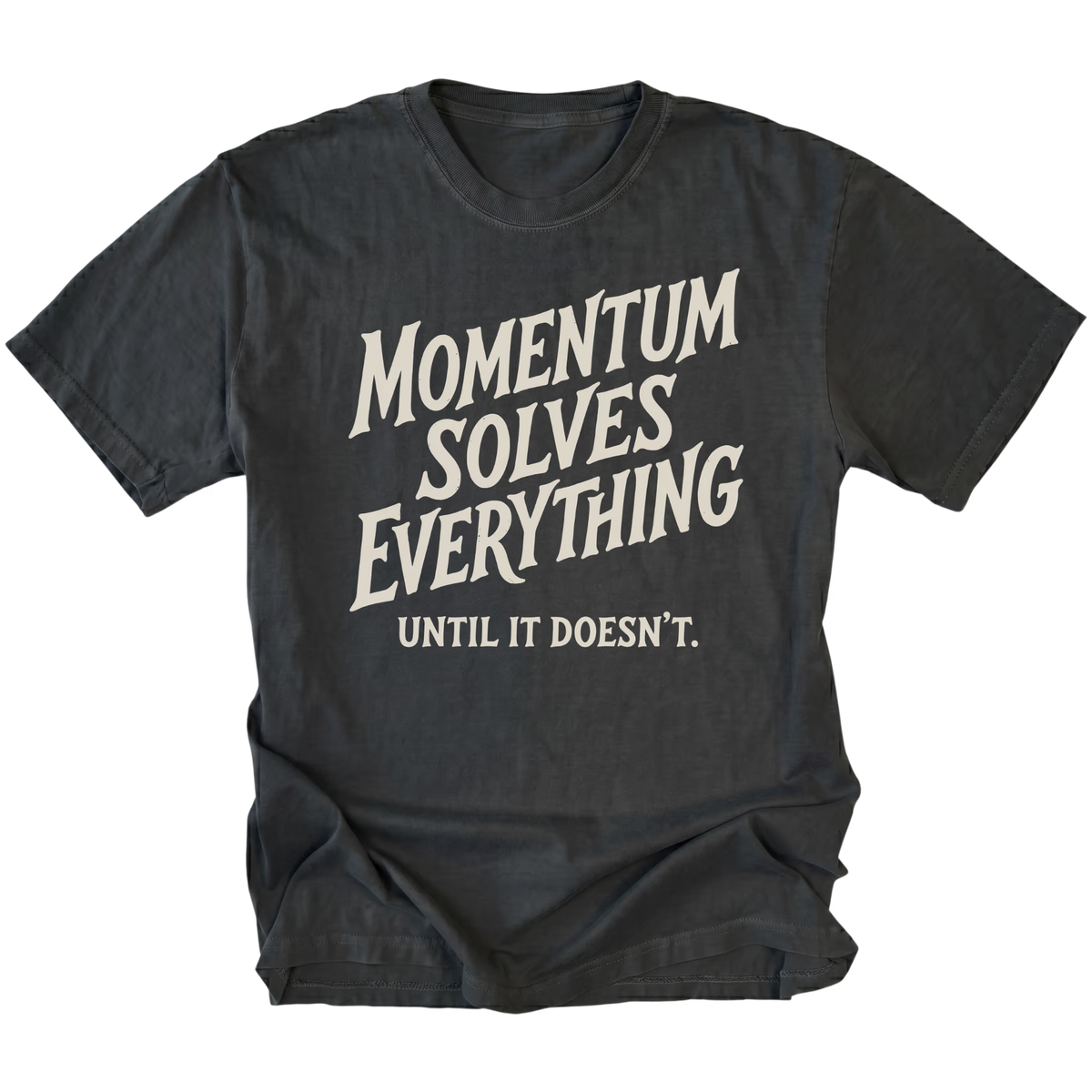 A black short-sleeve t-shirt with a distressed cream-colored graphic text that reads 'MOMENTUM SOLVES EVERYTHING UNTIL IT DOESN'T.' on a solid white background.