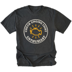 Black t-shirt featuring check engine light enthusiast circular engine warning graphic shown from the front by Trail Snark.