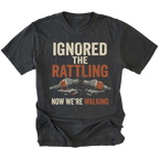 Black T-Shirt with “Ignored The Rattling Now We’re Walking” broken axle design shown on front view by Trail Snark.