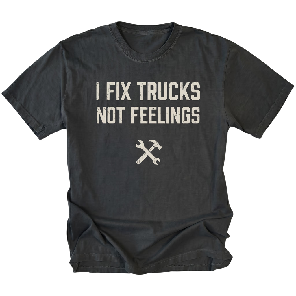 Black t-shirt with bold distressed text reading I Fix Trucks Not Feelings and crossed wrench and hammer icon.