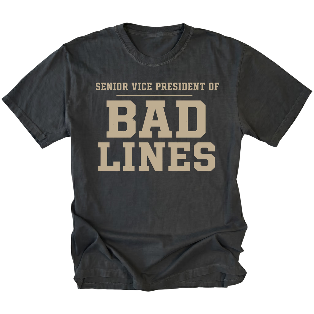 Black T-Shirt featuring the Senior Vice President of Bad Lines design shown in front view by Trail Snark.