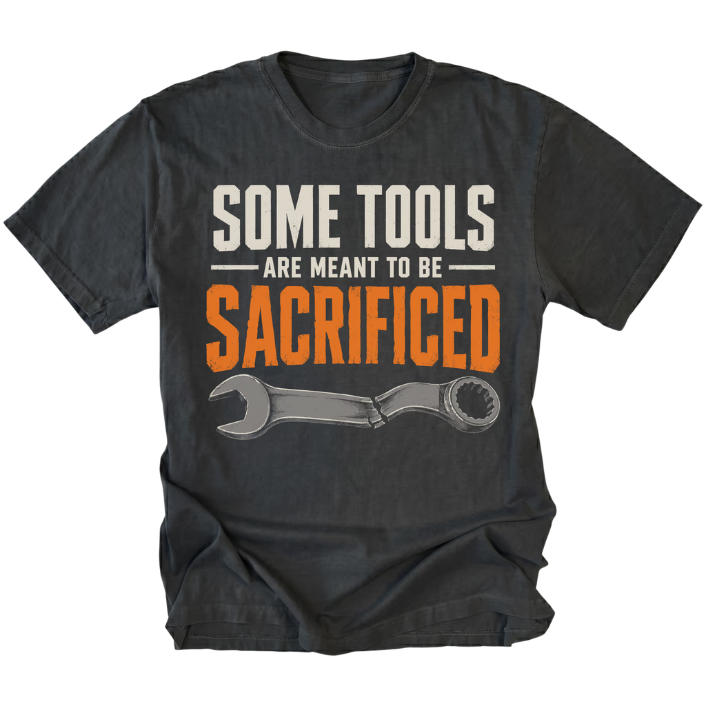 Black T-shirt featuring the Sacrificial Tools design with a broken wrench on the front by Trail Snark.