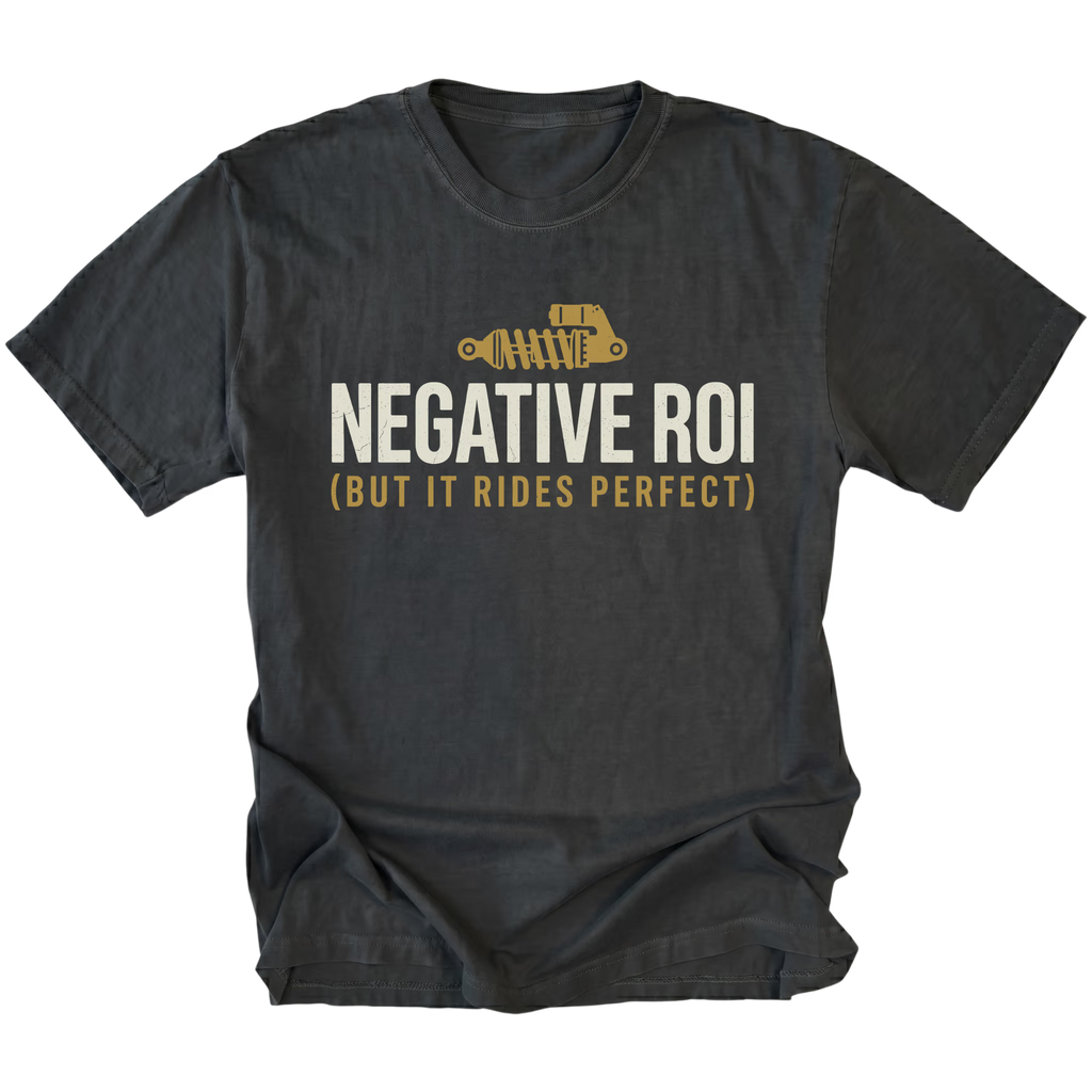 Black T-Shirt featuring the Negative ROI (But It Rides Perfect) design on the front view by Trail Snark.