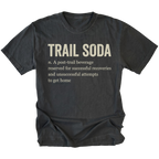 A black t-shirt with a humorous definition of 'Trail Soda' printed in beige text on the front, displayed against a solid white background.