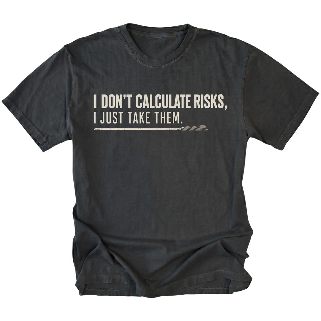 Black T-shirt featuring the Risk Taker design on the front by Trail Snark.