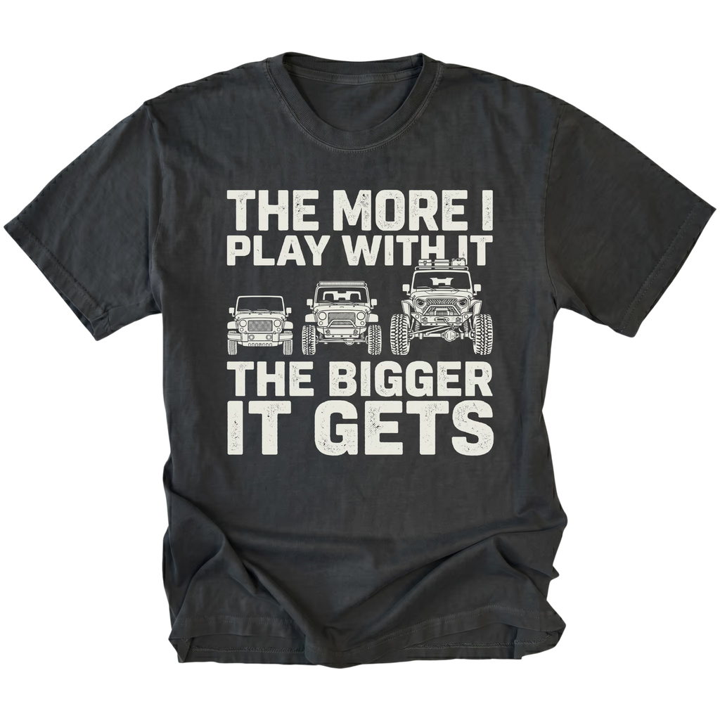 Black T-Shirt featuring The More I Play With It The Bigger It Gets design with three progressively built Jeeps on the front view by Trail Snark.