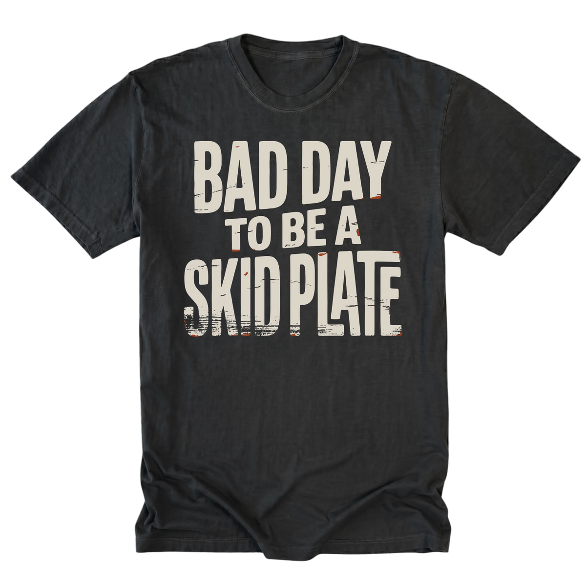 A black tall t-shirt with a distressed white graphic text reading 'BAD DAY TO BE A SKID PLATE' on the front, displayed flat against a solid white background.