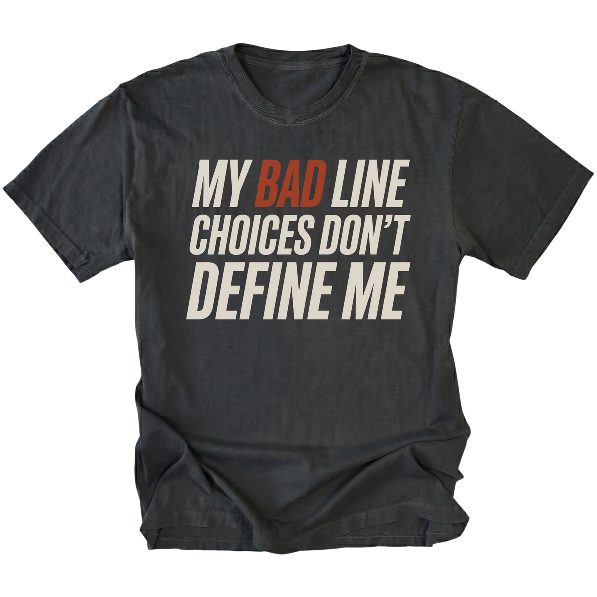 Black crewneck T-shirt shown from the front with large slanted off-white lettering reading "MY BAD LINE CHOICES DON'T DEFINE ME"; "BAD" is highlighted in rust orange.