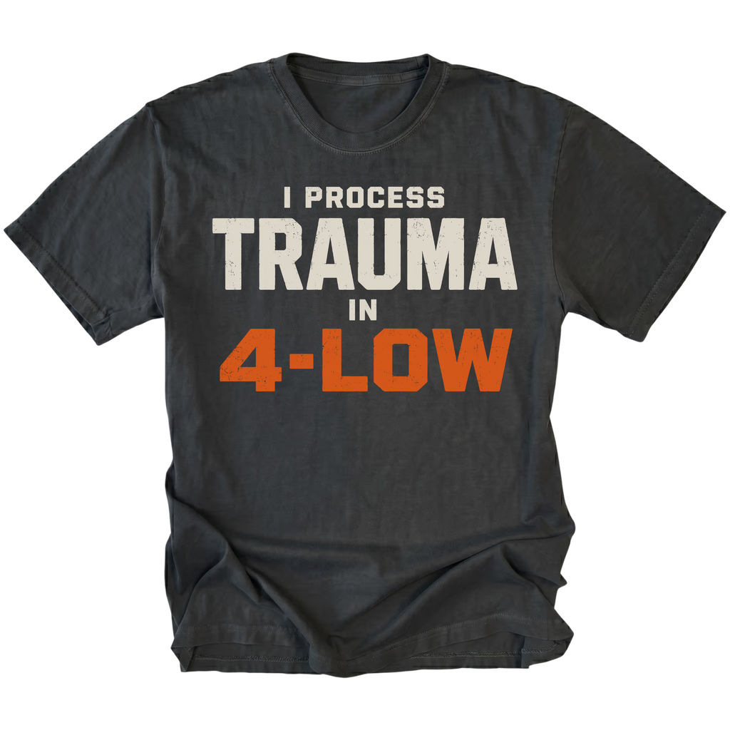Black t-shirt featuring the 4-Low Trauma design on the front by Trail Snark.