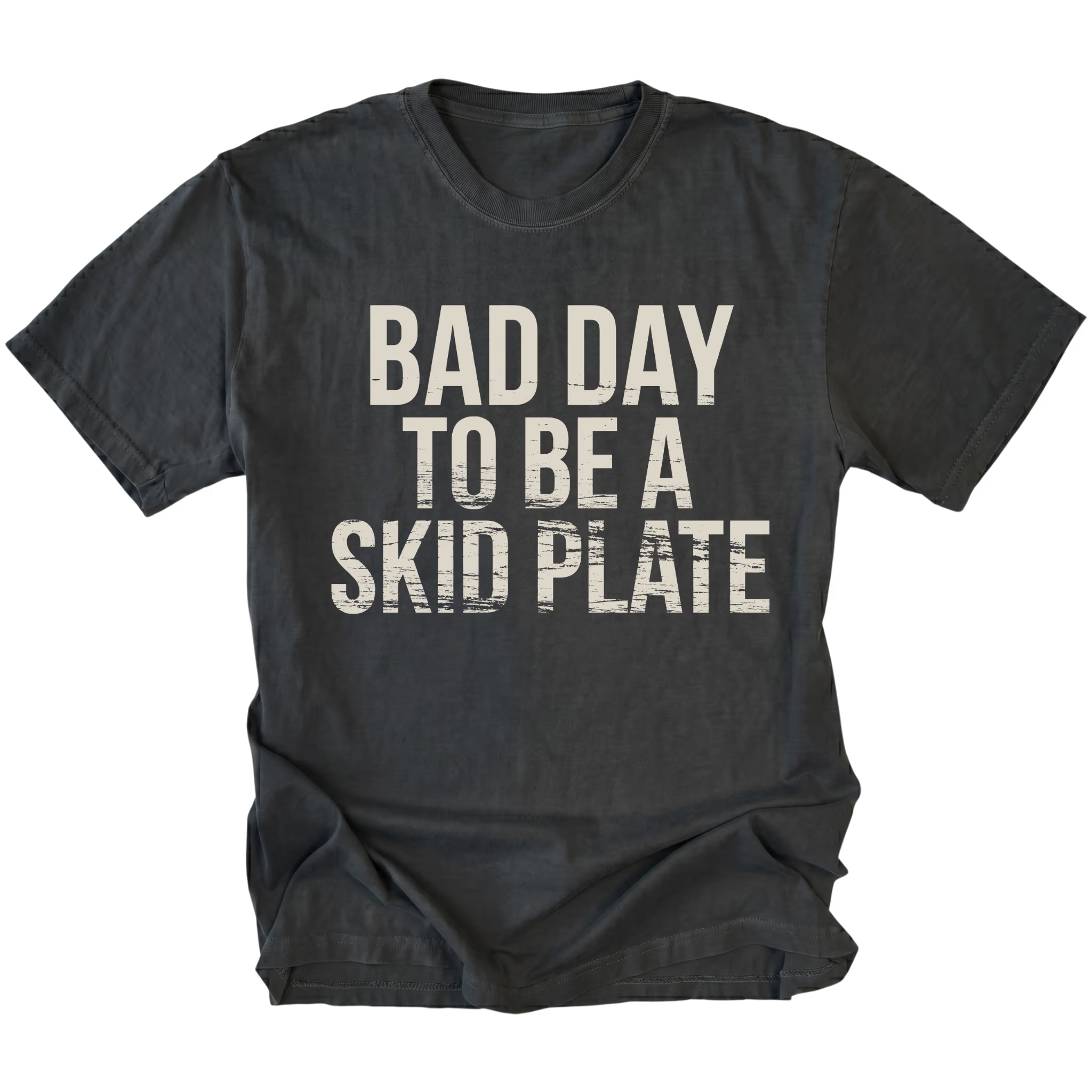 Black t-shirt featuring bold bad day to be a skid plate text graphic shown from the front by Trail Snark.