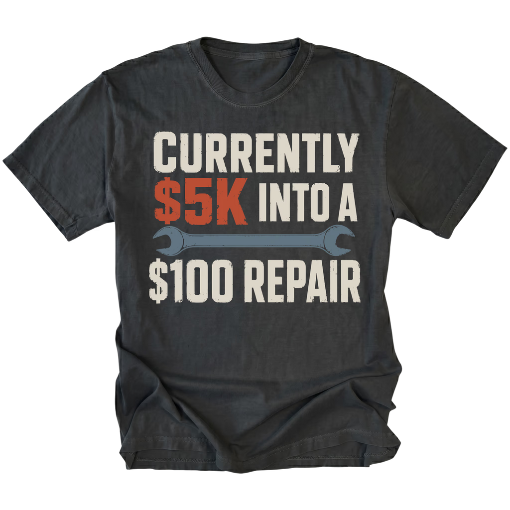Black T-Shirt featuring the five-thousand-dollar repair design on the front by Trail Snark.