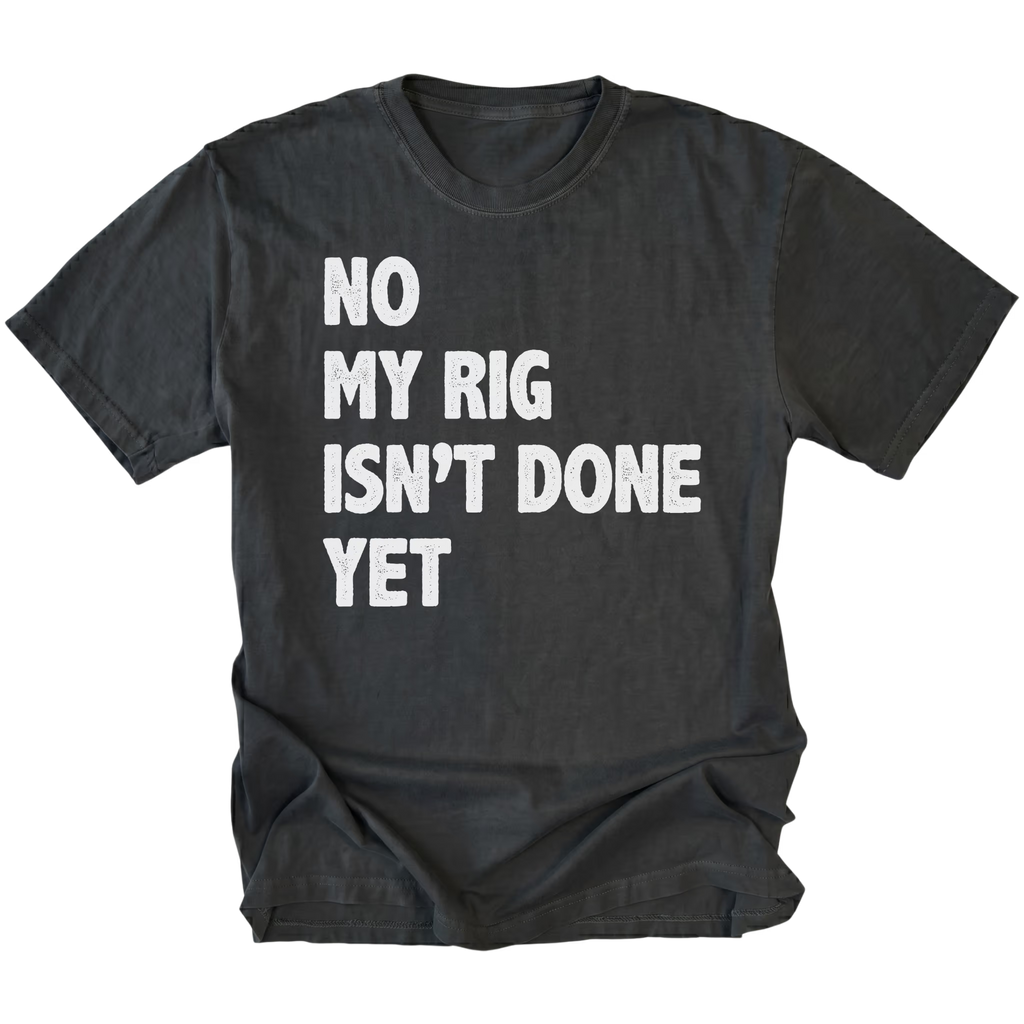Black T-Shirt featuring the No My Rig Isn’t Done Yet design on the front by Trail Snark.