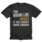 A black graphic t-shirt with a humorous quote printed on the front. The text reads 'THE WRONG LINE WORKS IF YOU COMMIT HARD ENOUGH' in distressed cream and mustard yellow fonts, displayed on a clean white background.