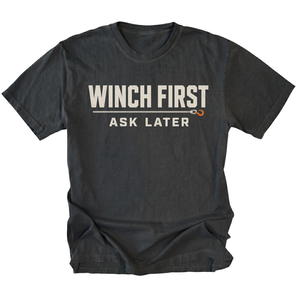 Black T-Shirt with Winch First Ask Later off-road recovery design shown from the front by Trail Snark.