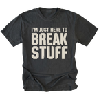 Black t-shirt with bold distressed text reading I’m Just Here To Break Stuff, front view by Trail Snark.