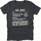 Black T-Shirt with “Dr Dirt” prescription-style graphic and Overlanding Is My Therapy text shown on front view by Trail Snark.
