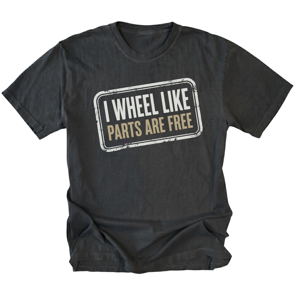 Black T-Shirt with the I Wheel Like Parts Are Free design shown in a front view by Trail Snark.
