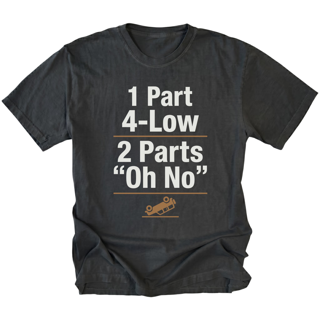 Black T-Shirt featuring the 1 Part 4-Low 2 Parts "Oh No" design with a tipped vehicle graphic on the front view by Trail Snark.