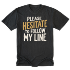 A black tall tee featuring the text 'PLEASE HESITATE TO FOLLOW MY LINE' in white and yellow gold on a white background.