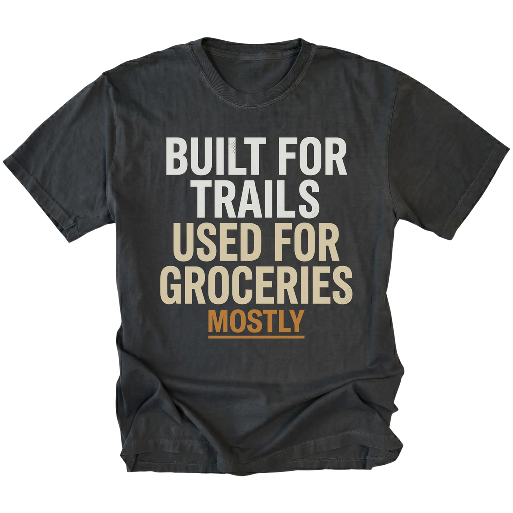 Black t-shirt featuring Built For Trails Used For Groceries Mostly design on front view by Trail Snark.