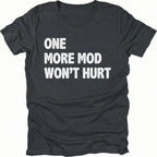 Black T-Shirt with bold white “One More Mod Won’t Hurt” text shown on front view by Trail Snark.