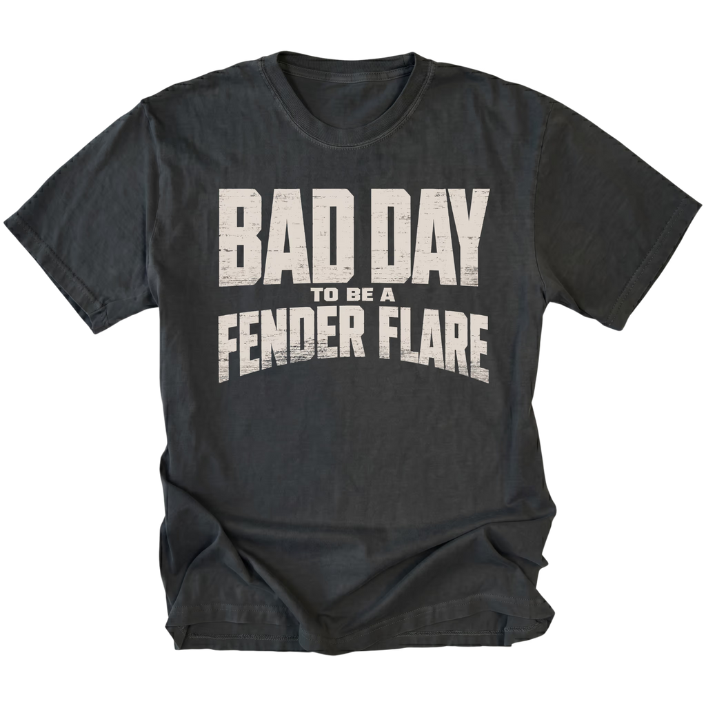 Black T-Shirt featuring the Bad Day To Be A Fender Flare design on the front by Trail Snark.