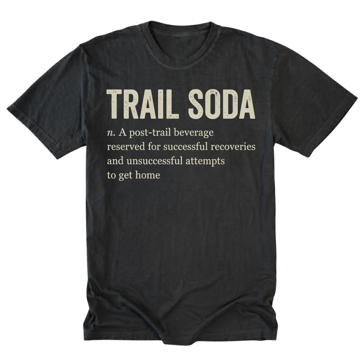 A black crewneck t-shirt with a humorous dictionary-style definition printed on the front reading 'TRAIL SODA' and a dictionary definition underneath, shown against a plain white background.