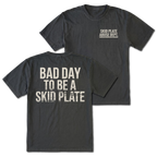 Black T-shirt with Bad Day To Be A Skid Plate back design and Skid Plate Abuse Dept. front chest print by Trail Snark.