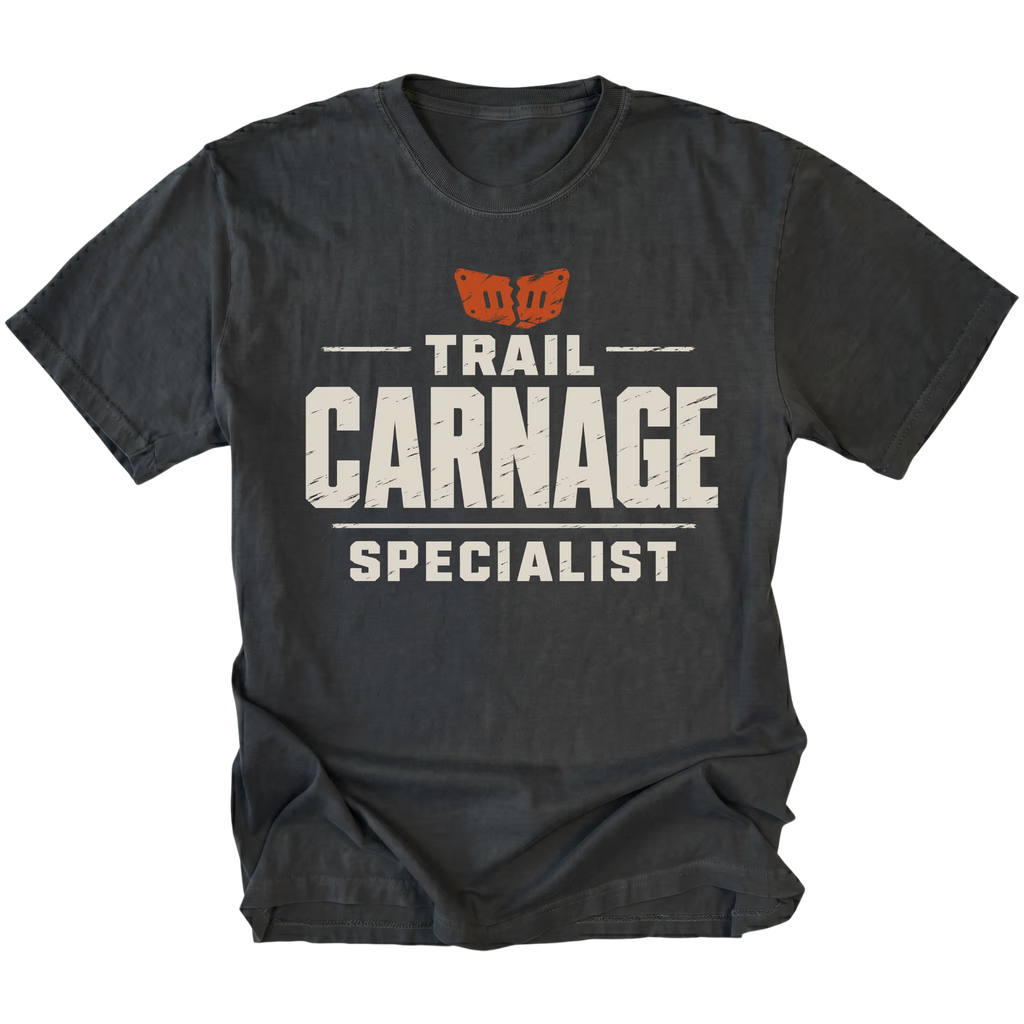 Black T-shirt featuring the Trail Carnage Specialist design on the front by Trail Snark.