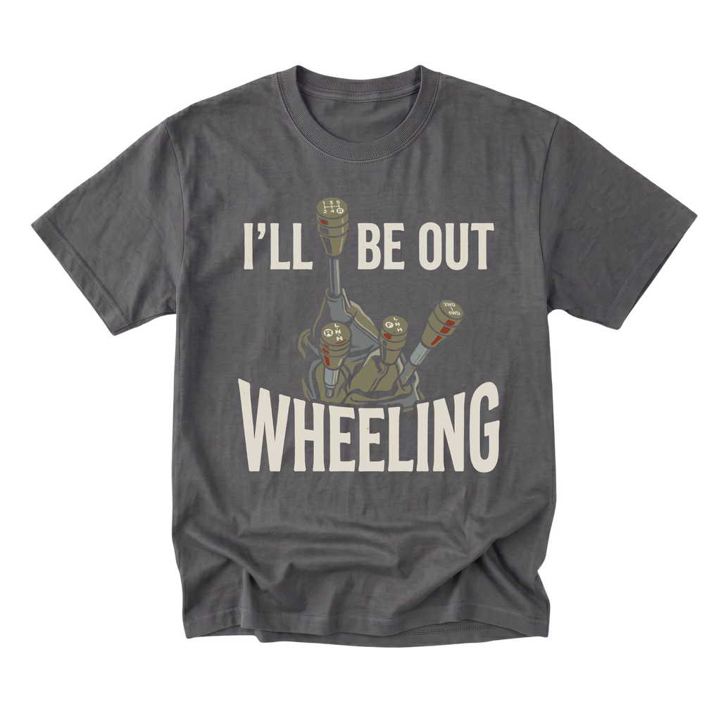 A charcoal gray crewneck t-shirt featuring a graphic of a robot giving a middle finger with the text 'I'LL BE OUT WHEELING' in a distressed off-white font, displayed on a solid white background.