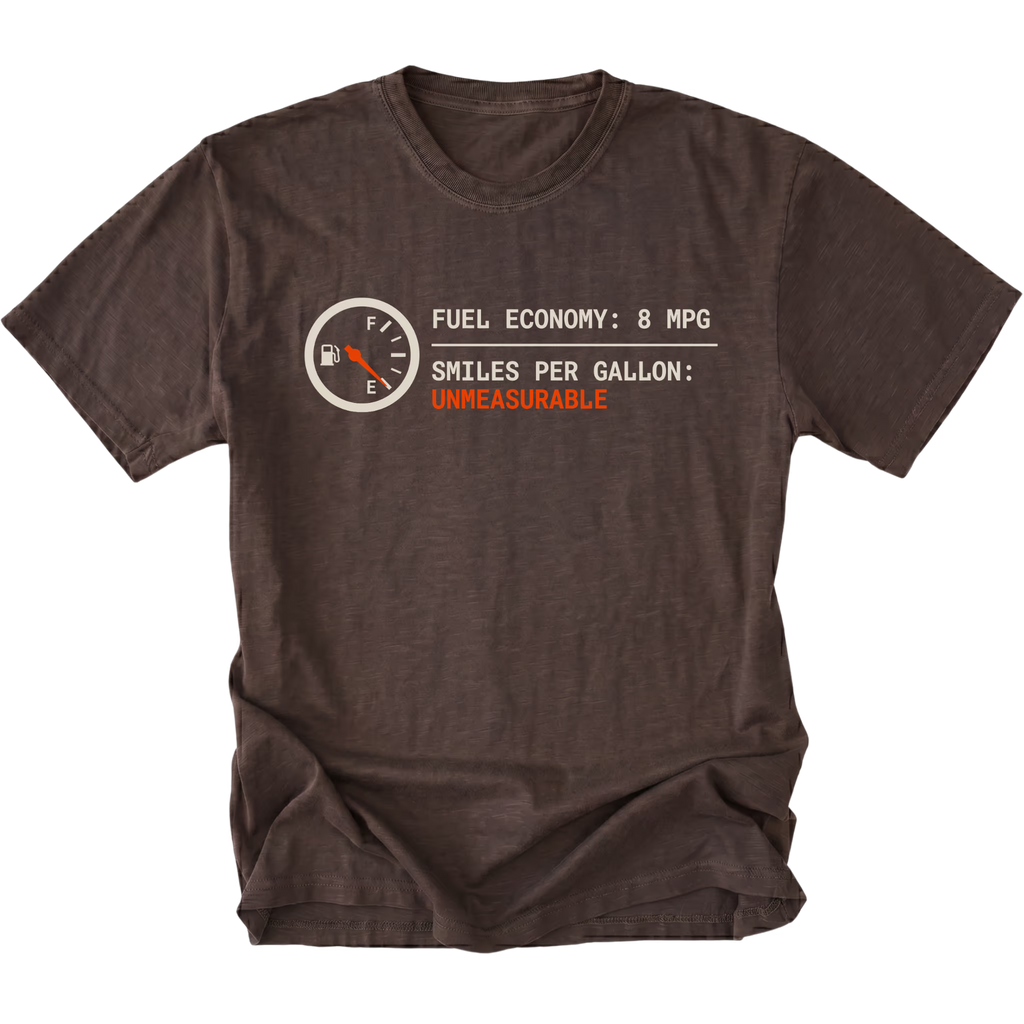 Espresso t-shirt featuring a fuel gauge graphic with text reading fuel economy 8 MPG and smiles per gallon unmeasurable displayed on the front.