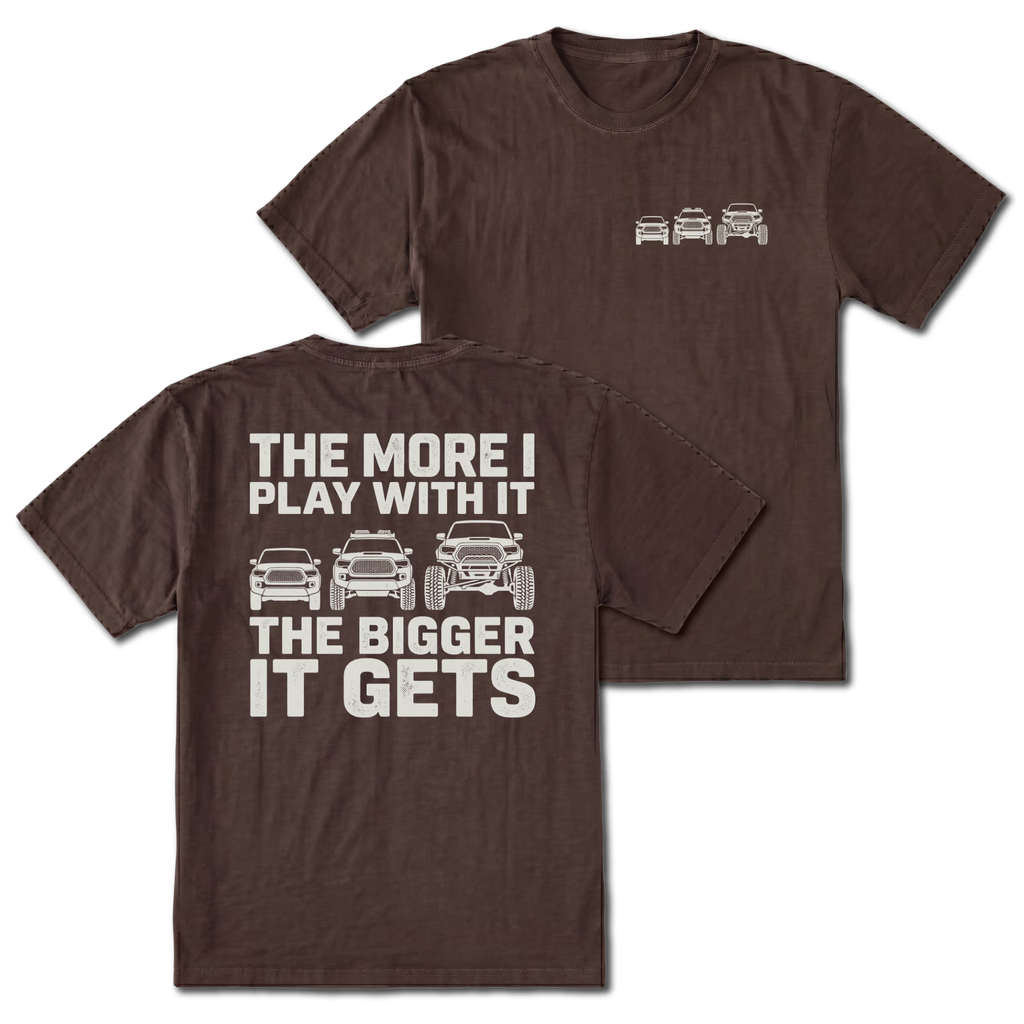 Espresso T-shirt with The More I Play With It The Bigger It Gets truck build design shown from the back view by Trail Snark.