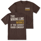 Two brown short-sleeve graphic T-shirts shown on a white background, with the front and back views overlapping. The front has small white and yellow text reading 'COMMIT HARDER' on the left chest.